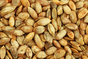 Food background - big shelled  roasted pumpkin seeds