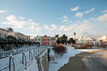 Santa Maria al Bagno beach after a exceptional snowfall, Salento, Italy