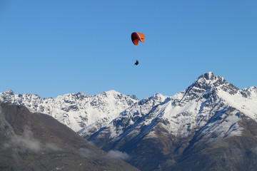 Paragliding above the mountains