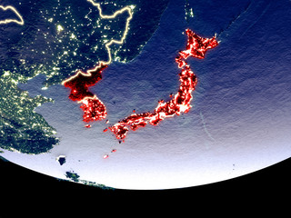 Obraz premium Satellite view of Japan and Korea from space at night. Beautifully detailed plastic planet surface with visible city lights.