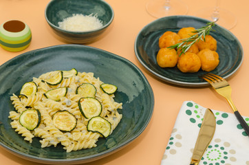 Creamy zucchini pasta with gorgonzola sauce. Delicious healthy Italian food. Pasta fusilli with gorgonzola sauce and zucchini 