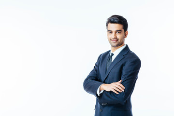 Portrait of a confident smiling businessman with arms crossed