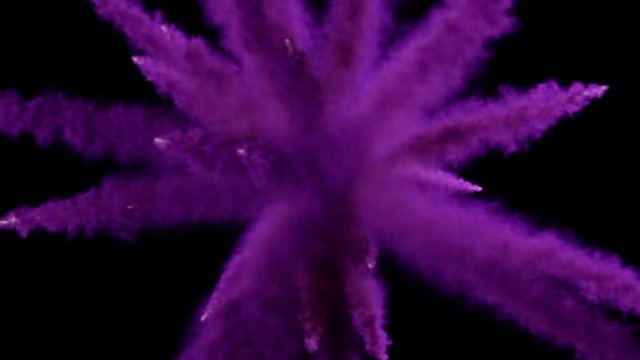 CG 3d animation of Colorful powder particles fly after being exploded against black background.