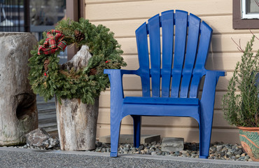 Christmas Wreath and Blue Chair at Pierfront