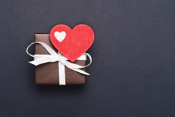 Gift to Valentine's Day with heart and packing tape. Isolate on white background