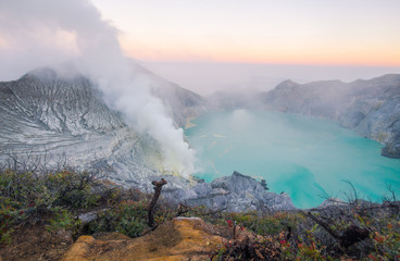Beautiful scenery view of Kawah Ijen volcano in Java island of Indonesia at dawn.