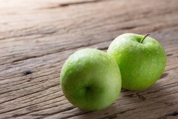 Fresh Green Apple on Wood