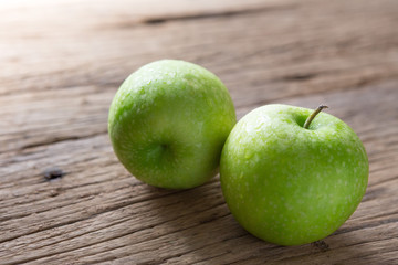Fresh Green Apple on Wood