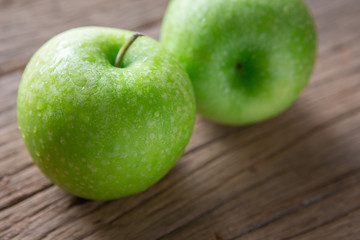 Fresh Green Apple on Wood
