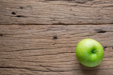 Fresh Green Apple on Wood
