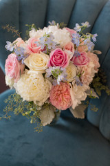 Closeup of pastel wedding bouquet.