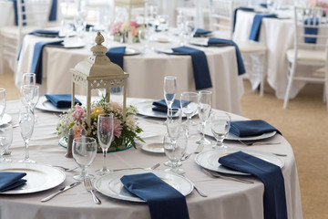 Elegant table setting at fancy restaurant for wedding