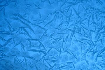 Obraz premium frost crystal on window glass in winter season