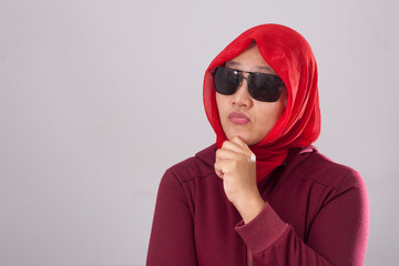 Muslim Lady in Red Thinking Something