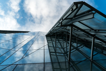 modern building with blue sky and clouds
