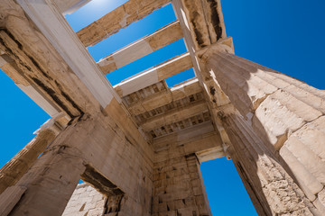 Looking up in the Propyla showing restoration, at the Acropolis, Athens, Greece in summer