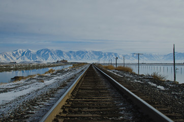 Down the long cold rusty rails on the tracks in the salt ponds in the utah basin. 