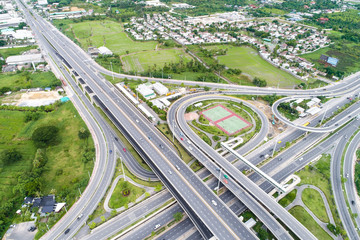 Aeriala view out bound city transport with circular junction road