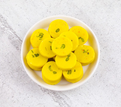 Indian Sweet Food Kesar Peda Also Know as Kesar Mawa Peda, Saffron Sweet, Saffron Peda, Pedha, Pera or Peday is a Saffron Flavoured Soft, Dense Sweet That is Specially Made During Festivals