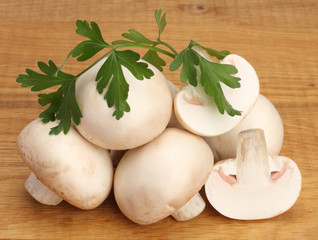 Mushrooms with parsley leaf isolated on white background
