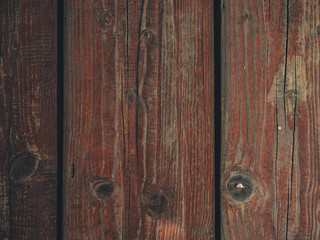 texture of wooden boards with cracked exfoliating old paint