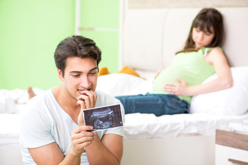 Young family finding out about pregnancy