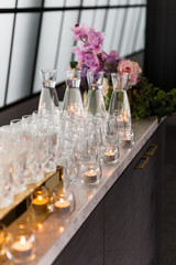 Water & glassware arrangement on the bar ready for an social event.