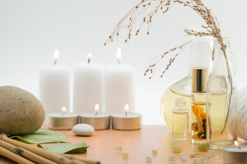 Spa concept, composition with bamboo, stones, leaves and candles