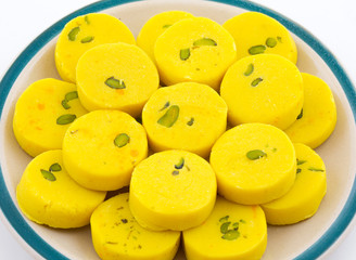Indian Sweet Food Kesar Peda Also Know as Kesar Mawa Peda, Saffron Sweet, Saffron Peda, Pedha, Pera or Peday is a Saffron Flavoured Soft, Dense Sweet That is Specially Made During Festivals