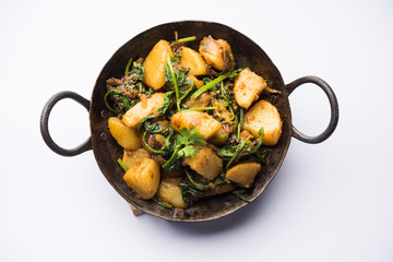 Aloo Palak sabzi - Potato cooked with spinach with added spices. a healthy Indian main course...