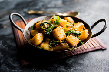 Aloo Palak sabzi - Potato cooked with spinach with added spices. a healthy Indian main course...