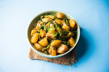 Aloo Palak sabzi - Potato cooked with spinach with added spices. a healthy Indian main course...