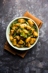 Aloo Palak sabzi - Potato cooked with spinach with added spices. a healthy Indian main course...