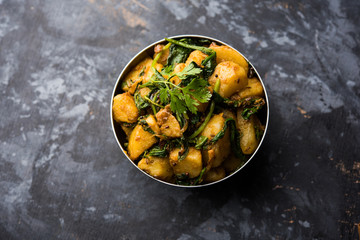 Aloo Palak sabzi - Potato cooked with spinach with added spices. a healthy Indian main course...