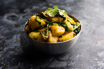 Aloo Palak sabzi - Potato cooked with spinach with added spices. a healthy Indian main course...