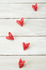 Love hearts on wooden texture background