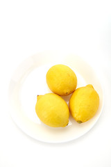Lemons on a white plate