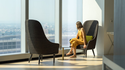 Lady in yellow enjoying the view of New York City