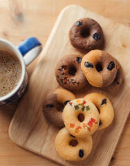 Mini donuts with a cup of hot drink