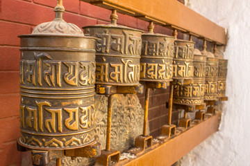 Kathmandu/Nepal - 14.11. 2018: Tibetan Buddhist spinning prayer drums with mantras