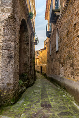 Fototapeta na wymiar Street in a Medieval Village in the Mountains of Southern Italy