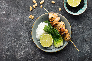 Teriyaki chicken skewers, cabbage bok choy, rice buddha bowl. Concept of healthy eating. Top View