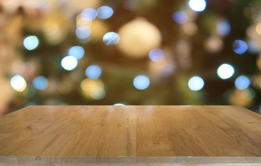 Empty dark wooden table in front of abstract blurred bokeh background of restaurant . can be used for display or montage your products.Mock up for space.