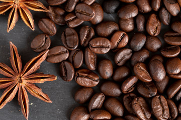 anise and coffee beans close-up on the stone table