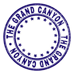 THE GRAND CANYON stamp seal watermark with distress texture. Designed with circles and stars. Blue vector rubber print of THE GRAND CANYON caption with dust texture.