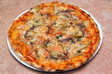 Close Up Of Delicious Vegetarian Pizza On The Plate, Marble Background