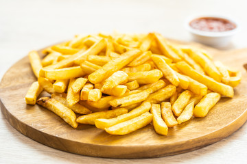 French fries with tomato or ketchup sauce