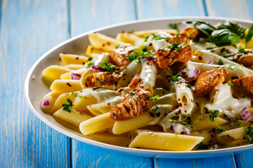 Pasta carbonara and vegetables