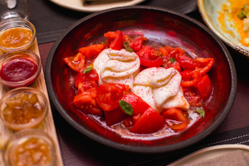 Traditional Italian dish Tasty Burrata and tomatoes