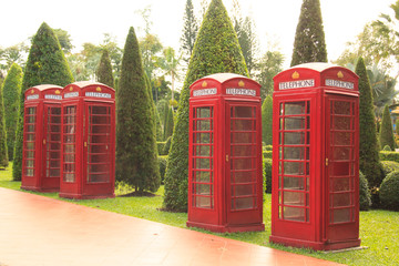 Fototapeta na wymiar Decorative English phone booths in Nong Nooch Tropical Park, Pattaya Thailand